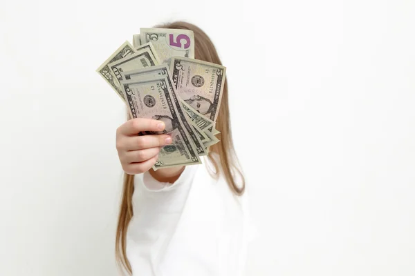 Niño y dinero en efectivo — Foto de Stock