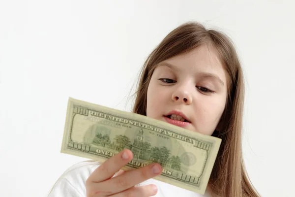 Niño y dinero en efectivo — Foto de Stock