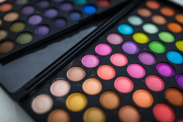 Make-up eye shadows (shallow DOF; color toned image) — Stock Photo, Image