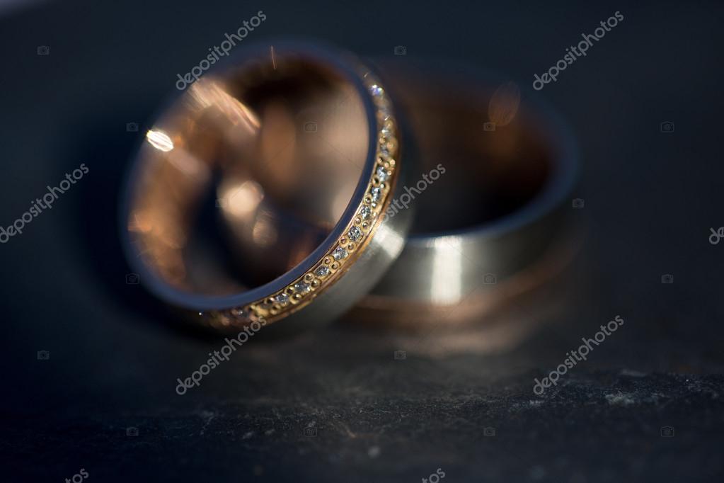 Wedding day details - two lovely golden wedding rings Stock Photo by ...