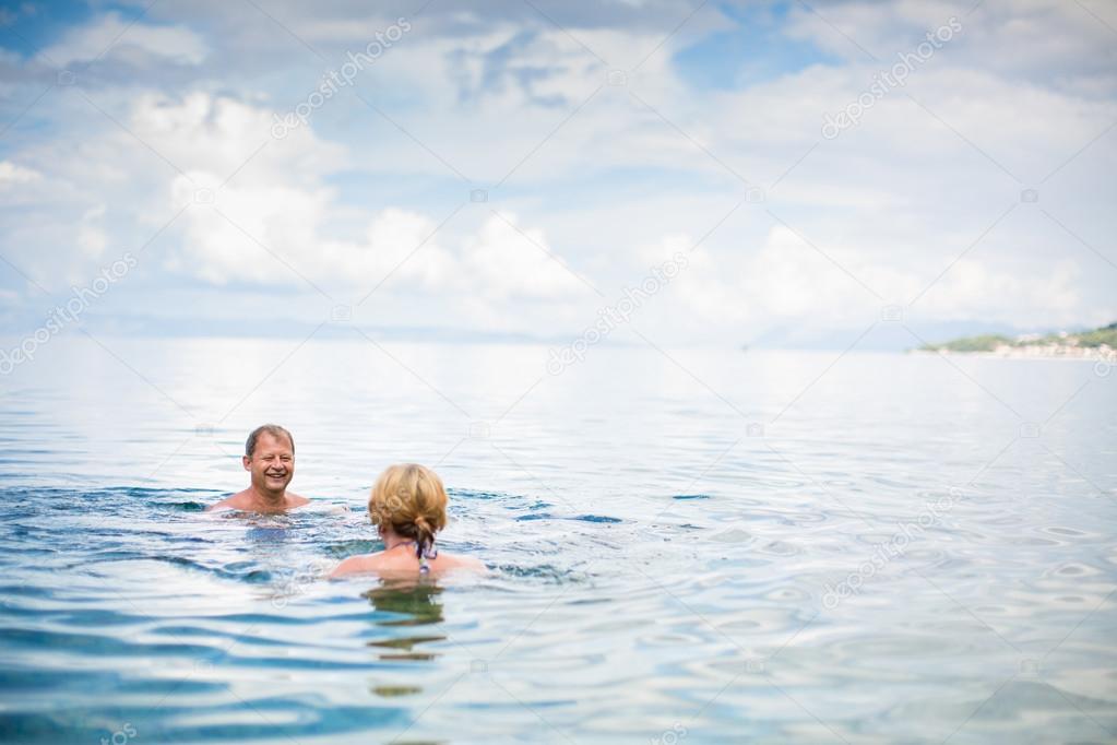 Senior couple enjoying the retirement on a seacoast