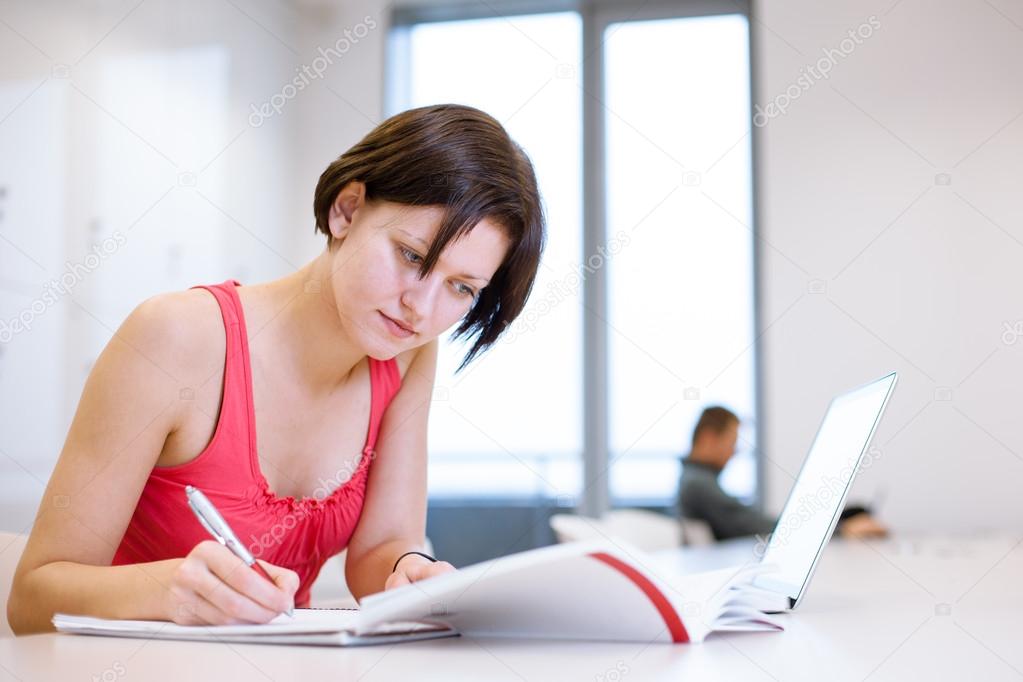 College student girl studying in the library