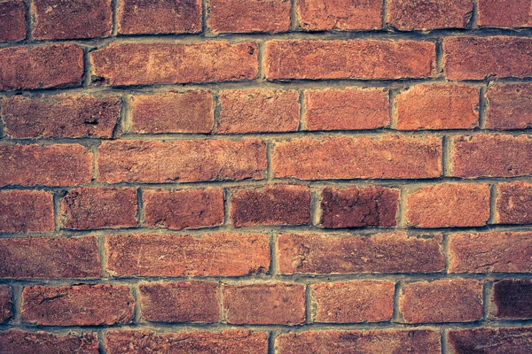 Weathered red brick wall background — Stock Photo, Image