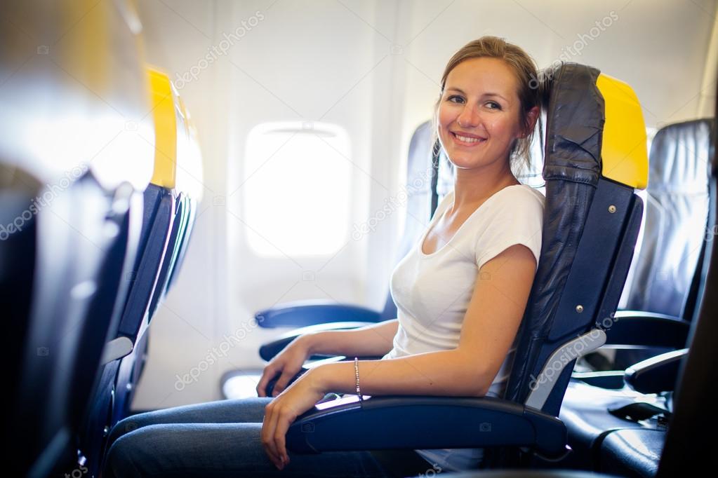 Female passenger on board of an aircraft