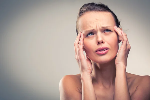 Gorgeous young woman with severe headache — Stock Photo, Image