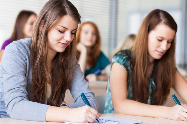 Students in a classroom during class Stock Image