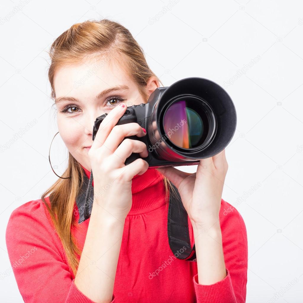 Female photographer with her digital camera