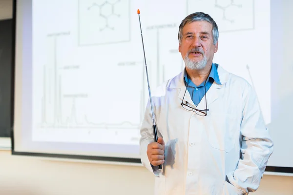 Senior chemistry professor giving a lecture — Stock Photo, Image