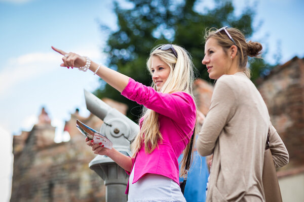 Young women sightseeing in Prague historic center