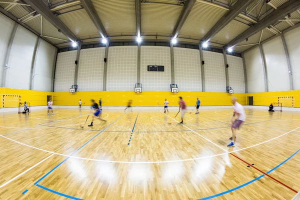 Modern multifunctional gymnasium with young people — Stock Photo, Image