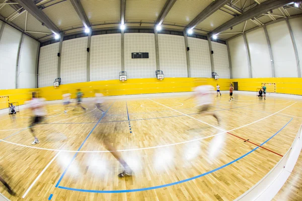 Modern multifunctional gymnasium with young people — Stock Photo, Image