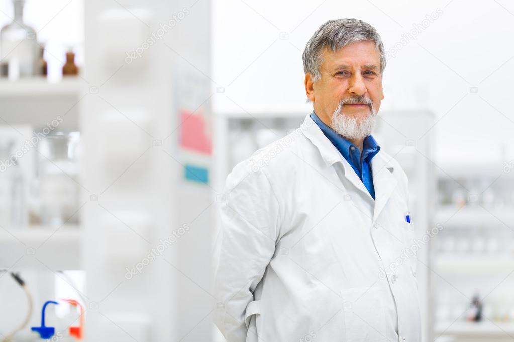 Senior male researcher carrying out scientific research in a lab