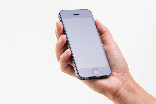 Kvinnliga handen håller en smart telefon — Stockfoto