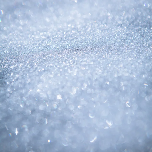 Fundo nevado - textura de neve branca espumante ao sol — Fotografia de Stock