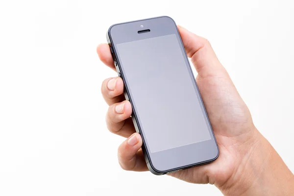 Vrouwelijke hand met een slimme telefoon — Stockfoto