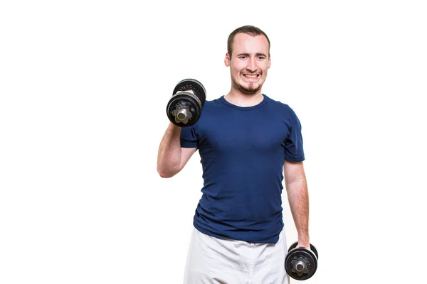 Close up of young man lifting weights over white background — Stock Photo, Image