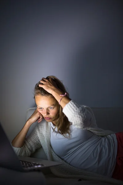 Very tired young woman, burning the midnigh oil — Stock Photo, Image