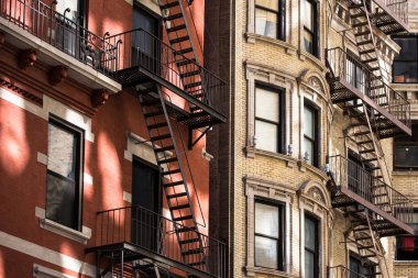 Old apartment building with fire escapes, Manhattan