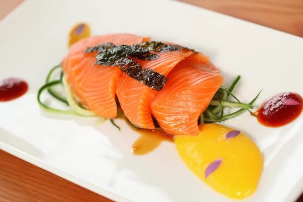 Salmon fillet decorated on a plate — Stock Photo, Image