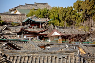 Traditional Korean style roof tops of Bukchon Hanok Village in S clipart