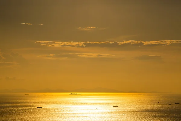 Sea sunset with sailing ships — Stok fotoğraf