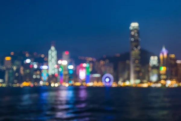 Stadt Nacht Licht verschwimmen Bokeh, defokussiert Hintergrund. — Stockfoto