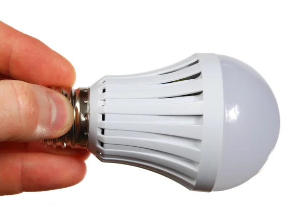 LED lampka w ręku — Zdjęcie stockowe