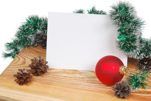 Tarjeta de Navidad en un tablero de madera —  Fotos de Stock