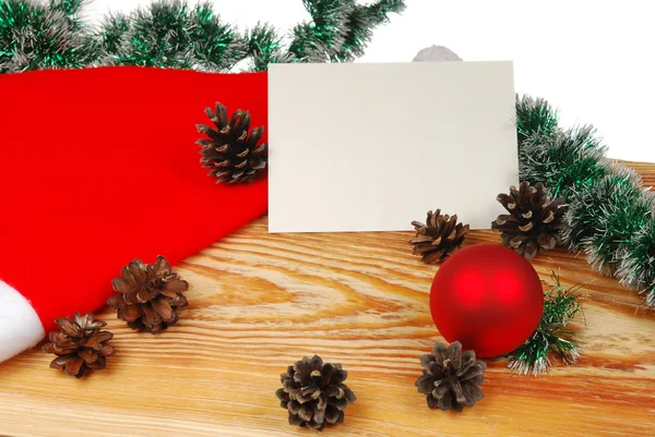 Kerstkaart op een houten bord — Stockfoto