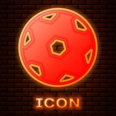 Parlayan neon futbol topu ikonu tuğla duvar arkasında izole edilmiş. Futbol topu. Spor malzemeleri. Vektör.