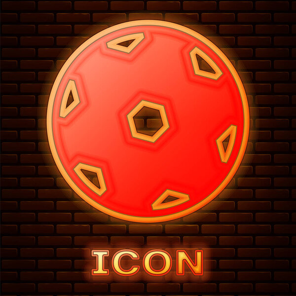 Glowing neon Football ball icon isolated on brick wall background. Soccer ball. Sport equipment.  Vector.