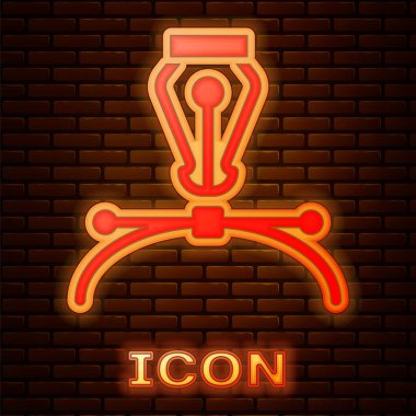 Parlayan Neon Fountain kalem ucu simgesi tuğla duvar arka planında izole edilmiş. Kalem aleti işareti. Vektör.