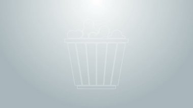 Gri arka planda izole edilmiş karton kutu simgesinde mavi çizgi patlamış mısır. Patlamış mısır kutusu. 4K Video hareketli grafik canlandırması