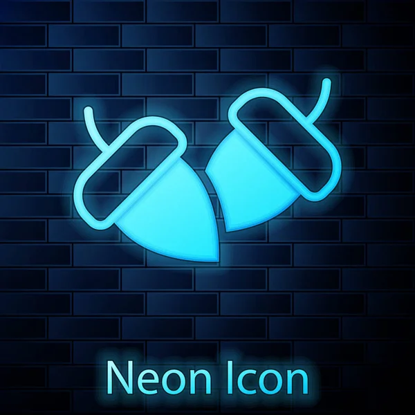 Gloeiende Neon Acorn Icoon Geïsoleerd Bakstenen Muur Achtergrond Vector — Stockvector