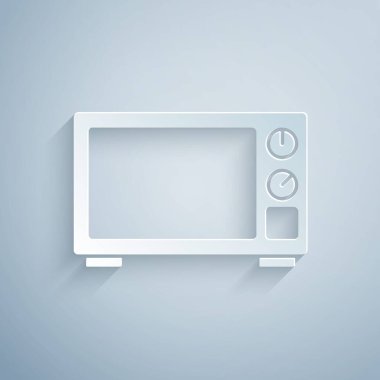 Kağıt kesiği mikrodalga fırın ikonu gri arka planda izole edilmiş. Ev aletleri simgesi. Kağıt sanatı tarzı. Vektör.