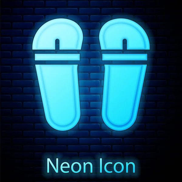 Gloeiende Neon Flip Flops Pictogram Geïsoleerd Bakstenen Muur Achtergrond Strandslippers — Stockvector