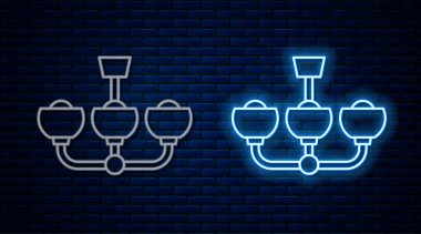 Parlak neon çizgisi olan Chandelier simgesi tuğla duvar arka planında izole edilmiş. Vektör