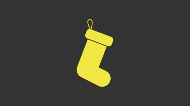 灰色の背景に隔離された黄色のクリスマスソックスアイコン。4Kビデオモーショングラフィックアニメーション — ストック動画
