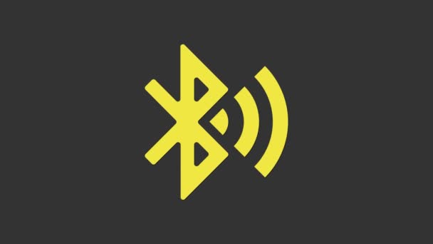 Żółta ikona Bluetooth połączona na szarym tle. 4K Animacja graficzna ruchu wideo — Wideo stockowe