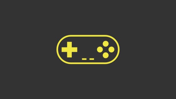 Желтый иконка Gamepad изолированы на сером фоне. Игровой контроллер. Видеографическая анимация 4K — стоковое видео