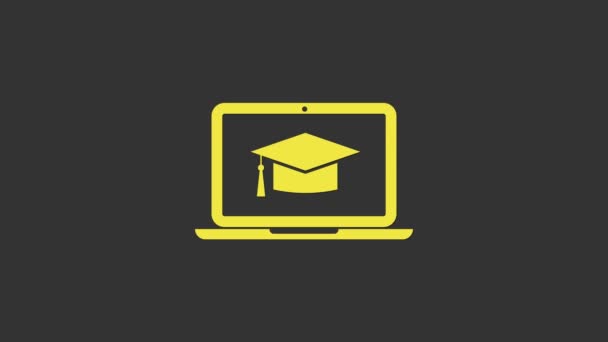 Tappo graduazione giallo sull'icona del computer portatile dello schermo isolato su sfondo grigio. Concetto di apprendimento online o e-learning. Animazione grafica 4K Video motion — Video Stock