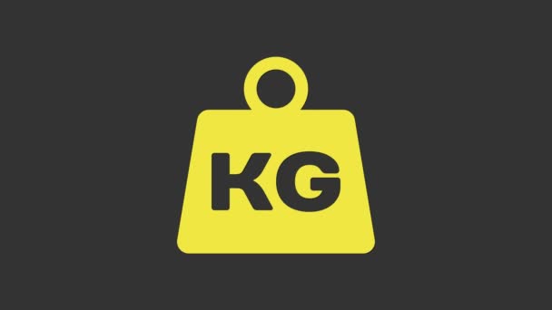 Иконка желтого веса выделена на сером фоне. Вес килограммового блока для подъема и взвешивания. Массовый символ. Видеографическая анимация 4K — стоковое видео