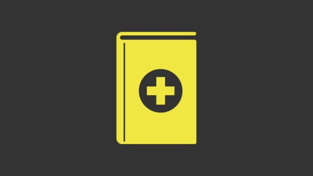 Icono amarillo del libro médico aislado sobre fondo gris. Animación gráfica de vídeo 4K — Vídeo de stock