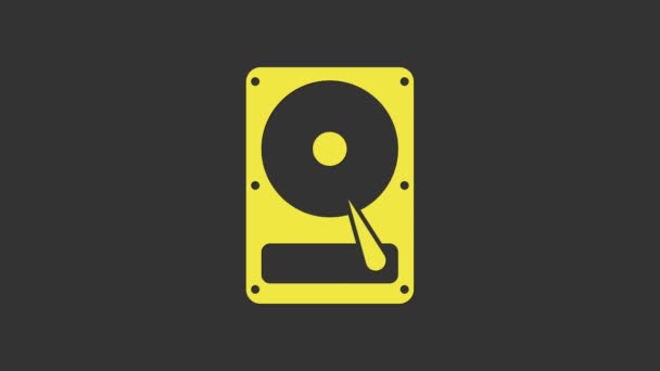 Ikona žlutého pevného disku HDD izolovaná na šedém pozadí. Grafická animace pohybu videa 4K — Stock video