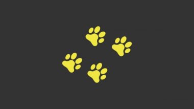 Sarı Paw yazdırma simgesi gri arkaplanda izole edildi. Köpek ya da kedi pençesi izi. Hayvan izleri. 4K Video hareketli grafik canlandırması
