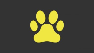 Sarı Paw yazdırma simgesi gri arkaplanda izole edildi. Köpek ya da kedi pençesi izi. Hayvan izleri. 4K Video hareketli grafik canlandırması
