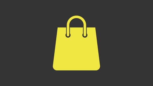 Icono del bolso amarillo aislado sobre fondo gris. Cartel de bolsa de compras. Icono de bolsa de mujer. Señal de bolso femenino. Equipaje casual glamour. Animación gráfica de vídeo 4K — Vídeos de Stock