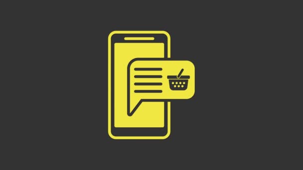黄色の携帯電話とショッピングバスケットのアイコンは灰色の背景に隔離された。オンライン購入記号。スーパーマーケットバスケットのシンボル。4Kビデオモーショングラフィックアニメーション — ストック動画
