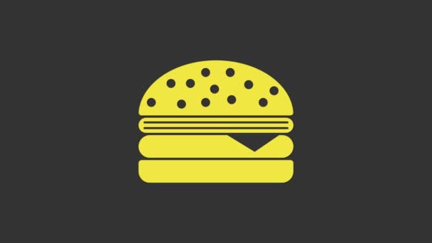 Gelbes Burger-Symbol isoliert auf grauem Hintergrund. Hamburger Ikone. Cheeseburger Sandwich-Schild. 4K Video Motion Grafik Animation — Stockvideo