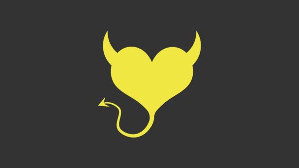शिंगांसह पिवळा भूत हृदय आणि राखाडी पार्श्वभूमीवर एक शेपटी चिन्ह वेगळे. व्हॅलेंटाईन डेचे प्रतीक. 4K व्हिडिओ गती ग्राफिक अॅनिमेशन — स्टॉक व्हिडिओ